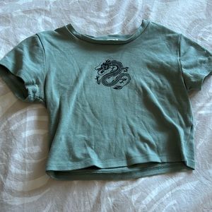 Really pretty green/colour with a black dragon on top.